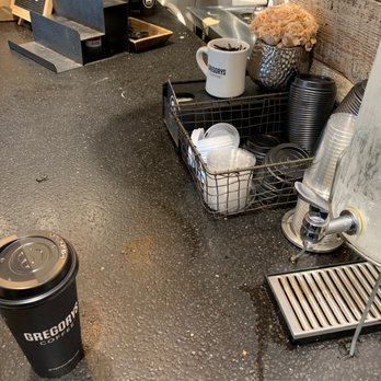Gregorys Coffee - Messy bar are with spills on counter. - Coffee & Tea Near Me - Brooklyn, New York Gregorys Coffee - Messy bar are with spills on counter. - Coffee & Tea Near Me - Brooklyn, New York