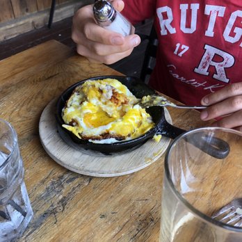 The Foundry at Summit Pond - Biscuits and gravy topped with eggs!!! Didn't even need the salt. - American Near Me - Killington, Vermont The Foundry at Summit Pond - Biscuits and gravy topped with eggs!!! Didn't even need the salt. - American Near Me - Killington, Vermont