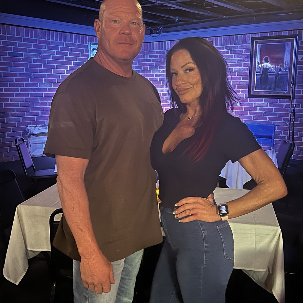 My fiancé and I in the eating area in front of the karaoke stage My fiancé and I in the eating area in front of the karaoke stage