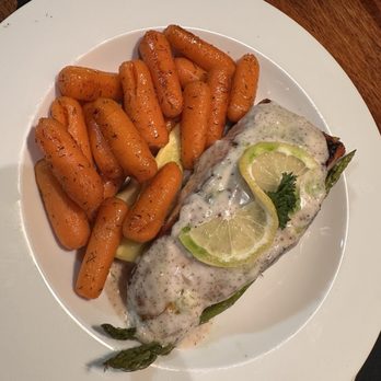 Legends Tap House & Grill - Salmon with a light wine sauce and glazed carrots, mixed vegetables asparagus, zucchini GRILLED SALMON - New American Near Me - Selma, California Legends Tap House & Grill - Salmon with a light wine sauce and glazed carrots, mixed vegetables asparagus, zucchini GRILLED SALMON - New American Near Me - Selma, California