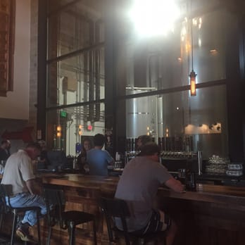 Coppertail Brewing Co - Cool bar area with view of the tanks - Bars Near Me - Tampa, Florida