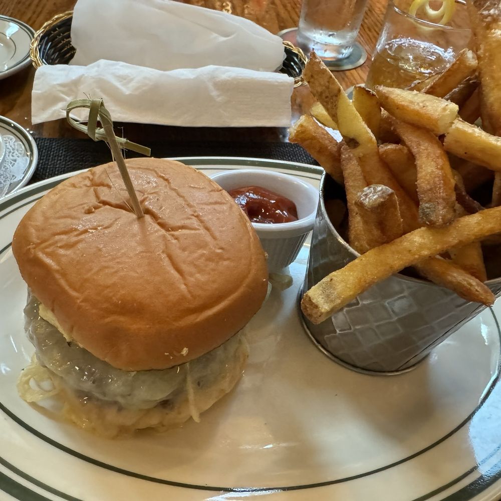 Alexander's - The Alexander burger with fries - Steakhouses Near Me - Ormond Beach, Florida