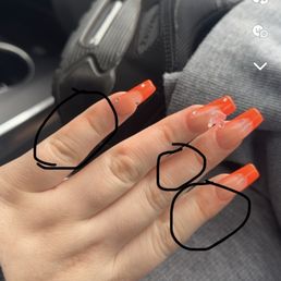 Orange all over my fingers and the line of nail glue that I had peeled of that they left. Very disappointed never coming back. Orange all over my fingers and the line of nail glue that I had peeled of that they left. Very disappointed never coming back.