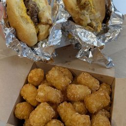 Cheeseburger, tuna melt slider, and tator tots Cheeseburger, tuna melt slider, and tator tots