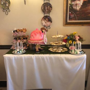 Vicky Bakery - a table with a cake and desserts - Bakeries Near Me - Pembroke Pines, Florida