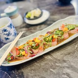 Sushi & Bowls - Life is short. Make each moment count. Having the hamachi jalapeño sashimi makes my belly happy and smile bigger.
