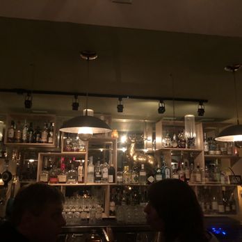 Bar Suzanne - two people sitting at a bar - Speakeasies Near Me - Montreal, Quebec Bar Suzanne - two people sitting at a bar - Speakeasies Near Me - Montreal, Quebec