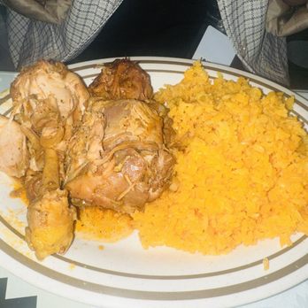 Latin American Restaurant - Pollo Guisado and yellow rice - Latin American Near Me - New York, New York Latin American Restaurant - Pollo Guisado and yellow rice - Latin American Near Me - New York, New York