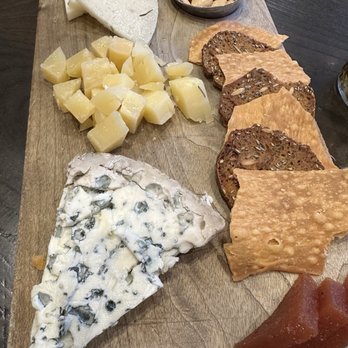 Mita's Restaurant and Bar - Cheese board with: VACA AÑEJO, CABRA AL' ROMERO, VALDEON - Spanish Near Me - Cincinnati, Ohio Mita's Restaurant and Bar - Cheese board with: VACA AÑEJO, CABRA AL' ROMERO, VALDEON - Spanish Near Me - Cincinnati, Ohio