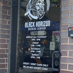 Black Horizon Brewing Company - Front door with hours