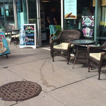 Beach Coffee - A couple of outside tables to enjoy your coffee or snack. - Coffee & Tea Near Me - Virginia Beach, Virginia