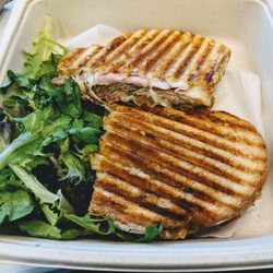 Mixed Greens - Cubano Panini - slow roasted soffrito pork, black forest ham, crisp dill pickle, baby swiss, yellow mustard, and roasted garlic aïoli.