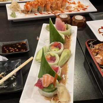 Wasabi Bistro - Sakura Roll on bottom (wrapped in cucumber), top is 007 Roll and middle is Pink Boy Roll - Japanese Near Me - Livermore, California Wasabi Bistro - Sakura Roll on bottom (wrapped in cucumber), top is 007 Roll and middle is Pink Boy Roll - Japanese Near Me - Livermore, California