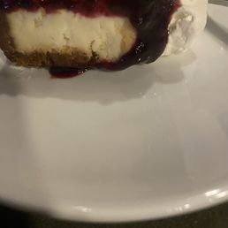 Cheesecake with blueberry drizzling Cheesecake with blueberry drizzling