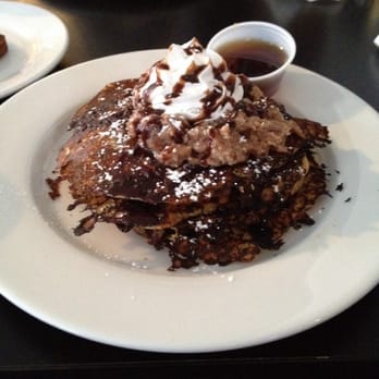 Mama's Boy - chocolate chip pancakes with pecan cream cheese topping & whipped cream chocolate ganache - Southern Near Me - Athens, Georgia