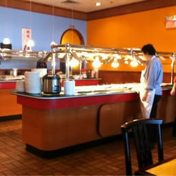 two people standing at the counter