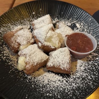 Flying Pig Pub & Kitchen - Beignets-half stuffed with banana pudding! The flavor was beyond words-c - Pubs Near Me - Oceanside, California Flying Pig Pub & Kitchen - Beignets-half stuffed with banana pudding! The flavor was beyond words-c - Pubs Near Me - Oceanside, California