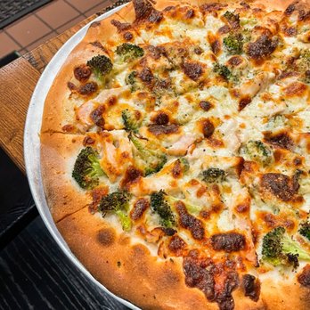 Santarpio's Pizza - a pizza with broccoli and cheese - Pizza Near Me - Boston, Massachusetts Santarpio's Pizza - a pizza with broccoli and cheese - Pizza Near Me - Boston, Massachusetts