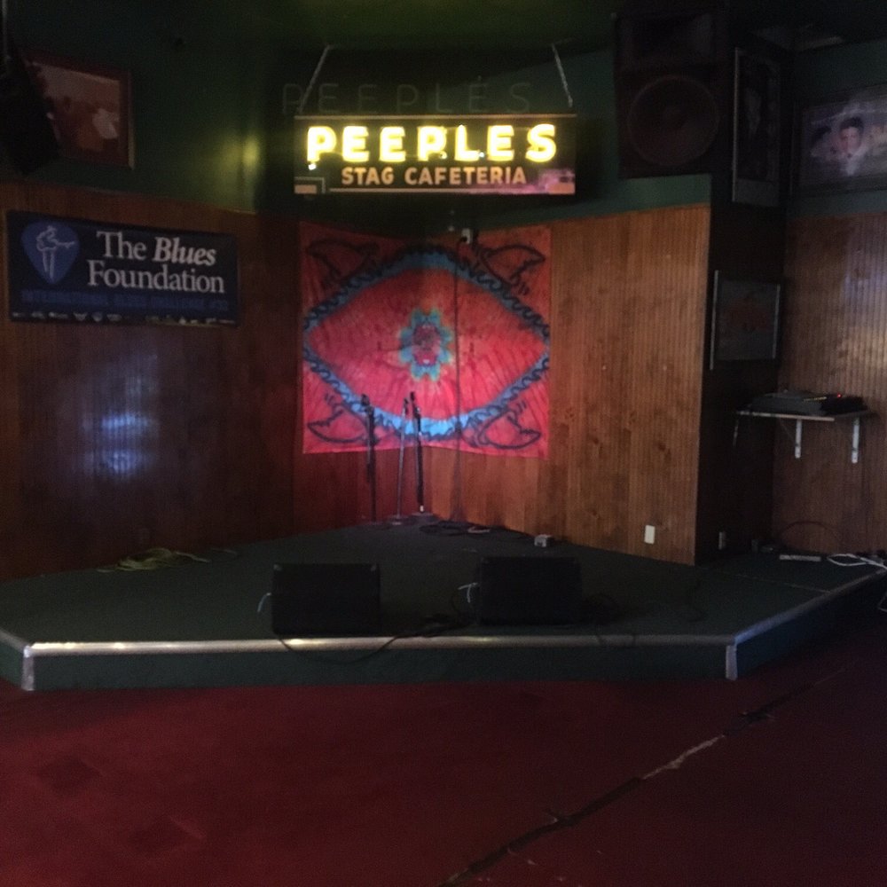 Peoples on Beale - a stage with speakers and a projector - Pool Halls Near Me - Memphis, Tennessee Peoples on Beale - a stage with speakers and a projector - Pool Halls Near Me - Memphis, Tennessee
