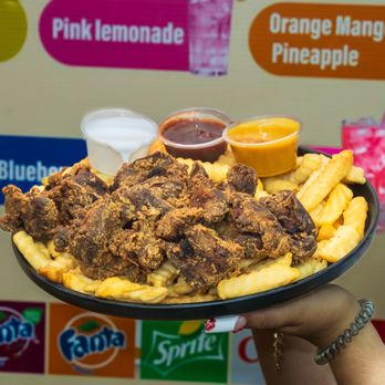 Thang's Fish and Chicken - A hearty platter of fried gizzards with fries, dipping sauces - Seafood Near Me - Houston, Texas Thang's Fish and Chicken - A hearty platter of fried gizzards with fries, dipping sauces - Seafood Near Me - Houston, Texas