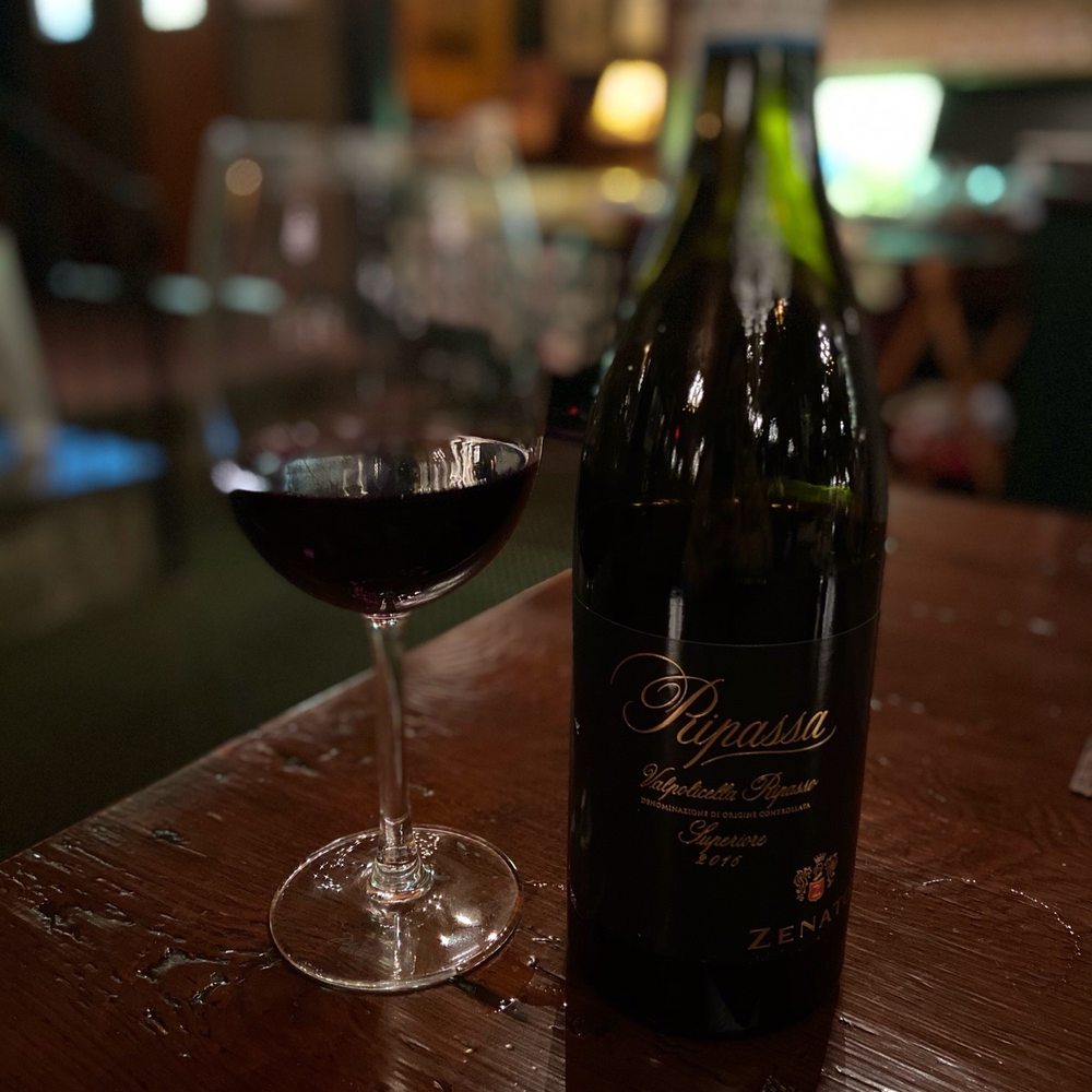 a bottle of wine and a glass of wine a bottle of wine and a glass of wine