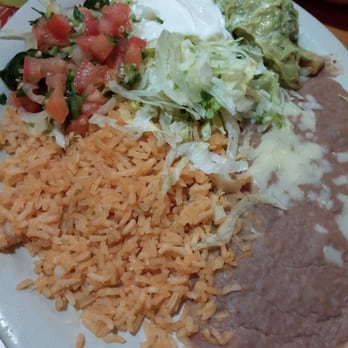 Don Chava's Mexican Grill - Rice, beans, salsa, guacamole and sour cream that accompany the fajitas - Mexican Near Me - Fort Wayne, Indiana
