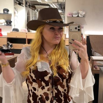American Lore - Trying on a sample hat - Whiskey Bars Near Me - Denver, Colorado American Lore - Trying on a sample hat - Whiskey Bars Near Me - Denver, Colorado