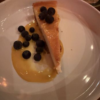 Savoy Society - Lemon cream cheesecake with mango curd - Cocktail Bars Near Me - Savannah, Georgia Savoy Society - Lemon cream cheesecake with mango curd - Cocktail Bars Near Me - Savannah, Georgia
