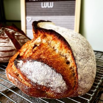 Lulu’s Maui Bakery - a loaf of bread on a cooling rack - Bakeries Near Me Lulu’s Maui Bakery - a loaf of bread on a cooling rack - Bakeries Near Me