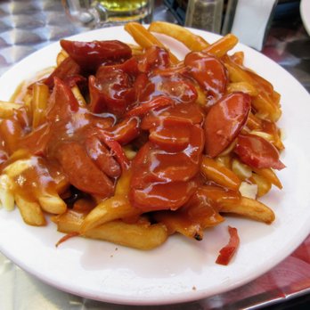 La Baraque du Vieux St-Vincent - Italian poutine. French fries, cheese curds, and meat sauce. $10.99. - Pizza Near Me - Montreal, Quebec