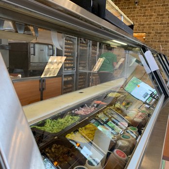Subway - a deli counter with a variety of food items - Sandwiches Near Me - Akron, Ohio