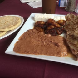 El Salvadoreno - Uninspiring plating, but after taking a bite of the steak and frijoles , all is forgiven. Yum!