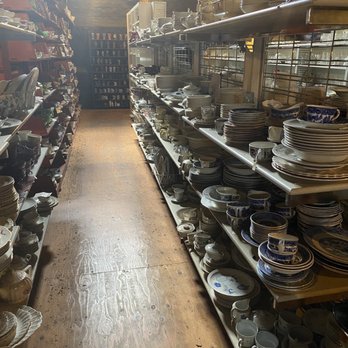 Fox Farm Antiques - Third floor, one of several rows of dishes - Antiques Near Me - Caledonia, New York