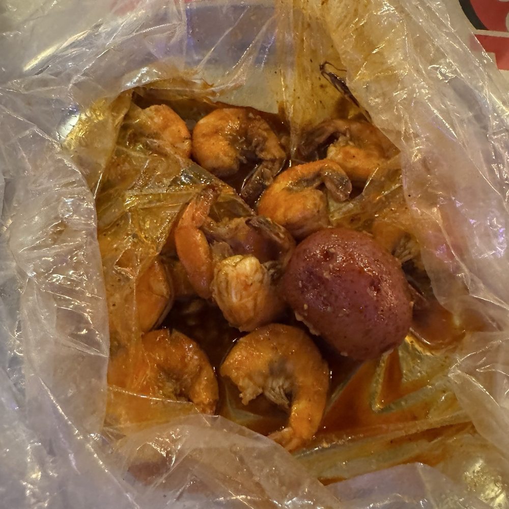 1/2 pound shrimp boil - no heads with Mr and Mrs crab sauce (medium) 1/2 pound shrimp boil - no heads with Mr and Mrs crab sauce (medium)