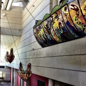 Hotel Murano - Glass canoes hanging from the ceiling in the main lobby - Hotels Near Me - Tacoma, Washington Hotel Murano - Glass canoes hanging from the ceiling in the main lobby - Hotels Near Me - Tacoma, Washington