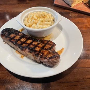 LongHorn Steakhouse - New York Strip with a side of Mac. If you're chronically online this Mac is what I imagine Tini's taste like. A good 7.6/10 for the entree. - American Near Me - Mesquite, Texas LongHorn Steakhouse - New York Strip with a side of Mac. If you're chronically online this Mac is what I imagine Tini's taste like. A good 7.6/10 for the entree. - American Near Me - Mesquite, Texas