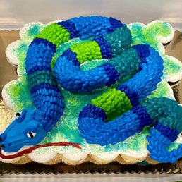 Three dozen cupcakes formed into a snake to make a boy's birthday dreams come true!