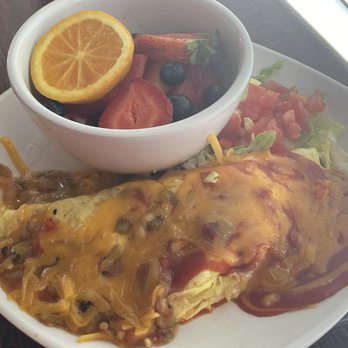 Cinnamon Sugar and Spice Cafe - Cinnamon Sugar & Spice Cafe.  Chorizo Omelet with a side of fruit. - Breakfast & Brunch Near Me - Albuquerque, New Mexico