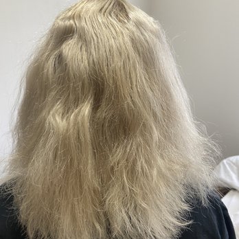 Mane Attraction Salon & Day Spa - Extremely dead even with leave in treatment given, color in the back looks yellow - Day Spas Near Me - Oshkosh, Wisconsin
