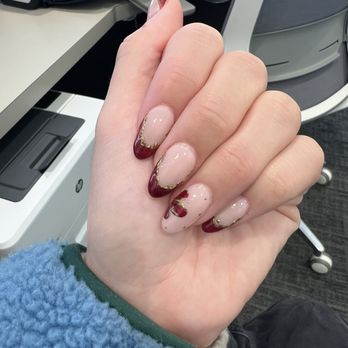 Nail Me - Red french tip nails with flower & chrome - Nail Salons Near Me - San Francisco, California