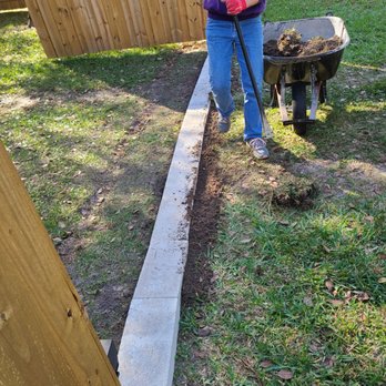 Santa Fe Overhead Doors - Cement blocks on the outside of the driveway Gate - Garage Door Services Near Me - Lake Butler, Florida Santa Fe Overhead Doors - Cement blocks on the outside of the driveway Gate - Garage Door Services Near Me - Lake Butler, Florida