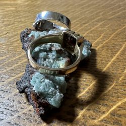 The gold ring needed to be enlarged. It fits perfectly now, and there's no sign of Mr. Kim's repair.