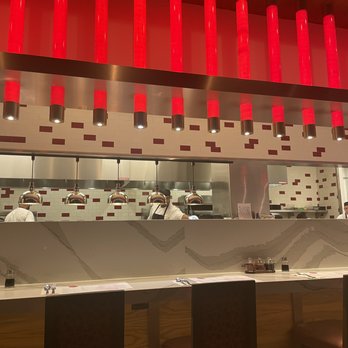 YOUYU - a view of a restaurant kitchen with red lights - Cantonese Near Me - Cincinnati, Ohio