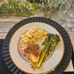 Everhart Gathering Place - Dinner of chicken thighs, Mac and Cheese with broccolini.