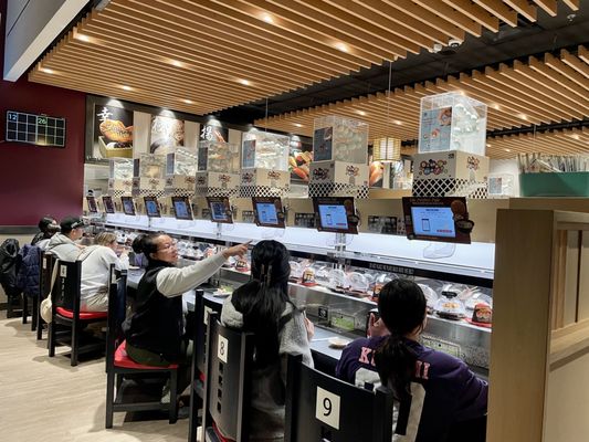 Kura Revolving Sushi Bar by null