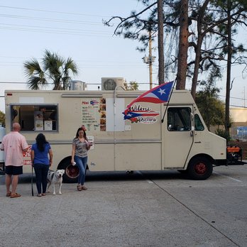 Wilmi Ricans - a group of people standing in front of a food truck - Food Trucks Near Me - Hampstead, North Carolina
