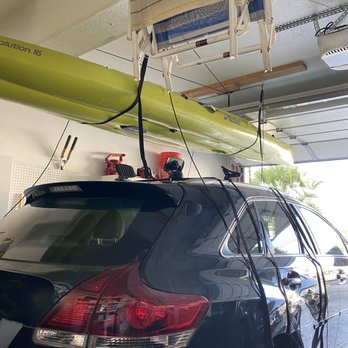 The Best Handyman - Kayak hoist with garage door open. - Handyman Near Me