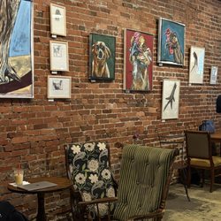 Tables and chairs, and art for purchase