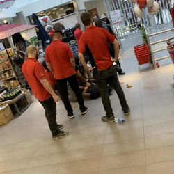 Canadian Tire - Woman employee standing proud and not doing anything to help this poor man.