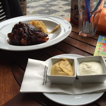 Restaurace Malostranská beseda - Pork knuckle with mustard and horseradish. - Czech Near Me - Prague, Puerto Rico Restaurace Malostranská beseda - Pork knuckle with mustard and horseradish. - Czech Near Me - Prague, Puerto Rico